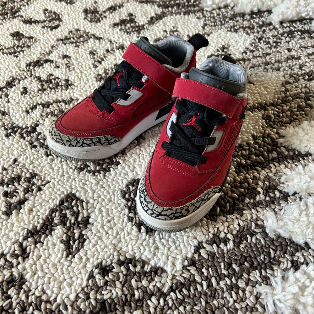 Jordan’s Red and Black Sneakers